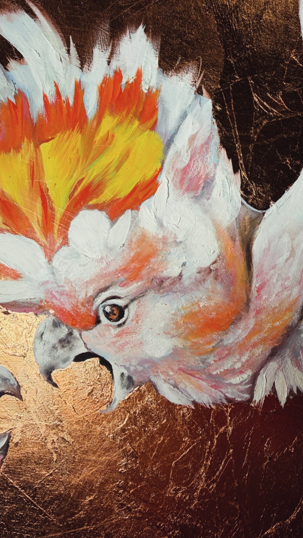 Detail of Serenade — the face of a cockatoo, crest of orange and gold against metal leaf